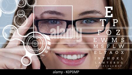 Digital composite of Woman with eye focus box detail over glasses and lines and Eye test interface Stock Photo