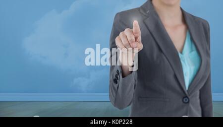 Digital composite of Businesswoman interacting with the air Stock Photo