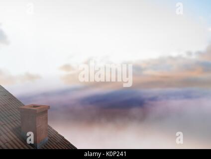 Digital composite of Roof with chimney and colorful clouds Stock Photo