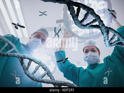 Digital composite of Doctors standing with 3D DNA strands Stock Photo