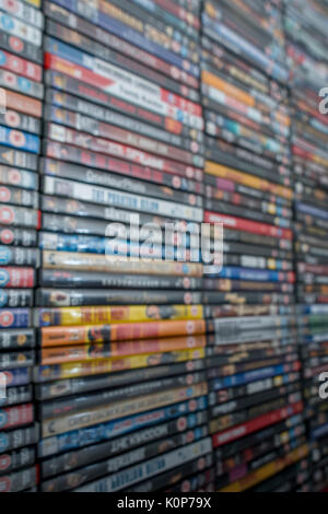 Soft focus stack of legacy DVD movies - for DVD / movie collection, films and entertainment in general, inventory, pirated or faked goods. Stock Photo