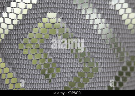 Macro of a white lace structure with blurred background. Stock Photo