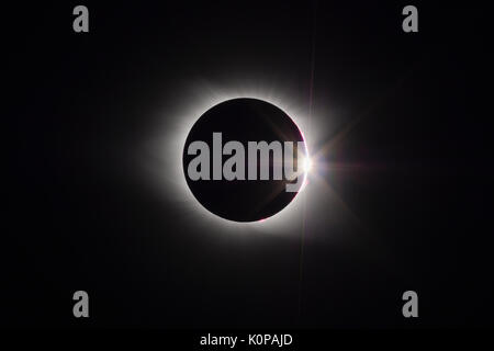 The Sun's corona and the diamond ring effect are visible at the end of the total eclipse phase of the Great American Eclipse on August 21, 2017. Stock Photo
