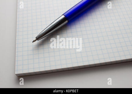 Empty notepad with a pen Stock Photo