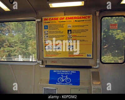 BART in car emergency instructions sign and bicycle area, CA, USA, Stock Photo