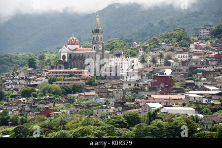 CUETZALAN, MEXICO - 2012: Panoramic view of the city, including the Parroquia de San Francisco de Asís church. Stock Photo