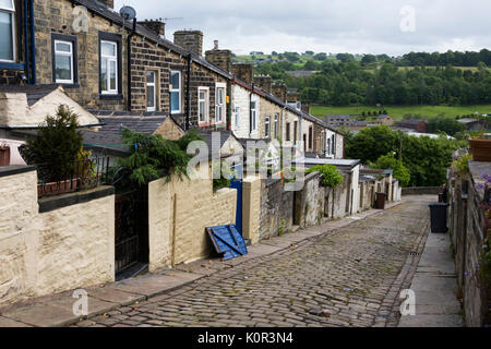 Millworkers' cottages on the back lane between Basil Street and Colne Lane, Colne, Lancashire, England, UK Stock Photo