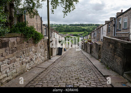 Millworkers' cottages on the back lane between Colne Lane and Basil Street, Colne, Lancashire, England, UK Stock Photo