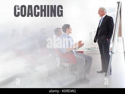 Digital composite of Coaching text and Business economics teacher with class Stock Photo