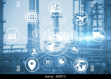 Composite image of currency amidst various icons against view of industry Stock Photo