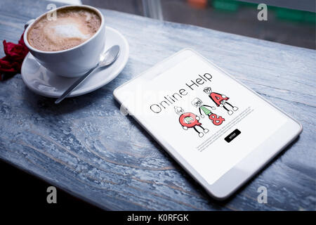 Human representations with letters and online help text against cappuccino and digital tablet on table Stock Photo