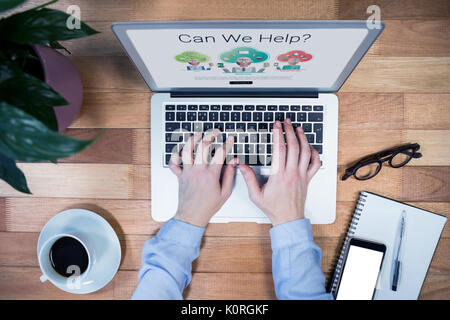 Human representations with can we help text against businesswoman working on laptop Stock Photo