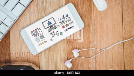 Digital composite of Table top with a phone with web graphics on the screen Stock Photo