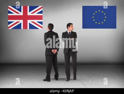 Digital composite of United Kingdom flag or Europe flag with Businessman looking in opposite directions Stock Photo