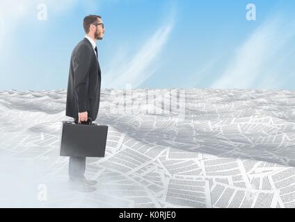 Digital composite of Businessman holding briefcase in sea of documents under sky clouds Stock Photo