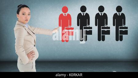 Digital composite of Businesswoman interacting and choosing a person from group of people icons Stock Photo