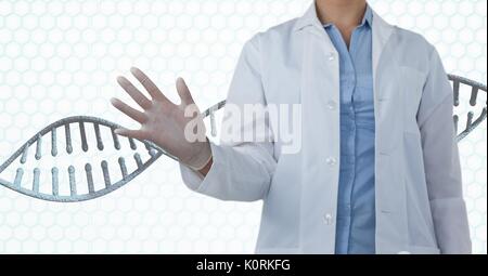 Digital composite of Doctor woman interacting with 3D DNA strand Stock Photo