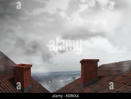Digital composite of Roofs with chimney and city clouds Stock Photo