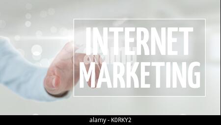 Digital composite of Hand interacting with internet marketing business text against white background Stock Photo