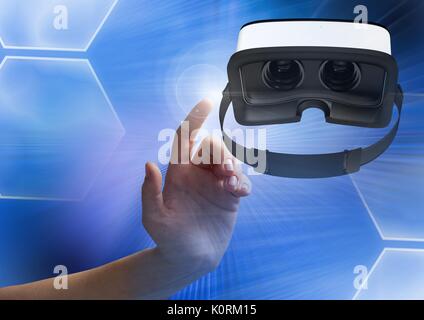 Digital composite of Hand touching and interacting with virtual reality headset with transition effect Stock Photo