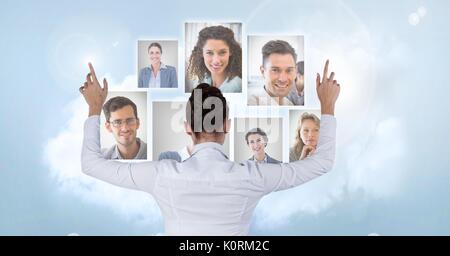 Digital composite of Businesswoman interacting and choosing a person from group of people interface Stock Photo