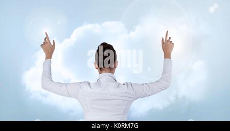 Digital composite of Businesswoman interacting with the air Stock Photo