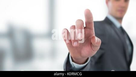 Digital composite of Businessman interacting with the air Stock Photo