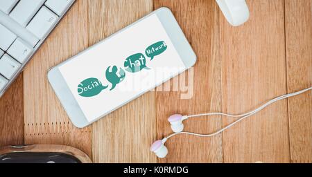 Digital composite of Table top with a phone with web graphics on the screen Stock Photo