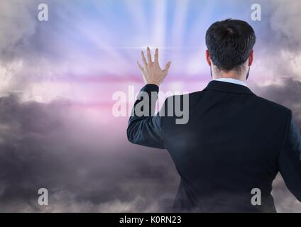 Digital composite of Man touching and interacting with transition effect Stock Photo