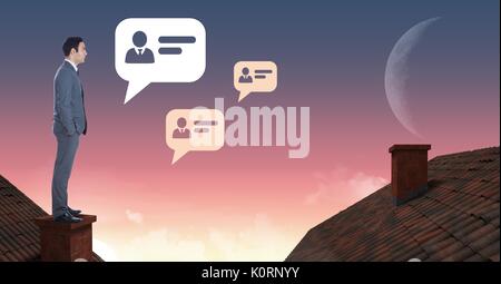 Digital composite of Chat profile icons and Businessman standing on Roofs with chimney and moon sky Stock Photo