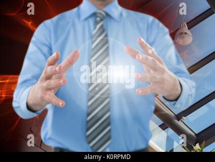 Digital composite of Man holding and interacting with transition effect Stock Photo