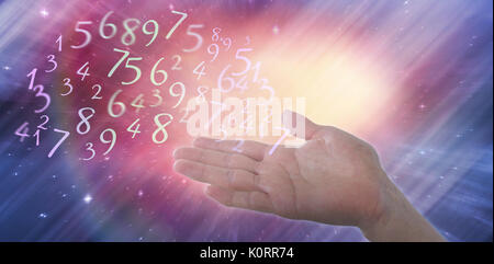 Cropped image of hand pretending to hold invisible object against digitally composite image of colorful lights Stock Photo