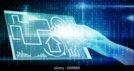 Close-up of cropped hand on white background against blue technology interface with binary code Stock Photo