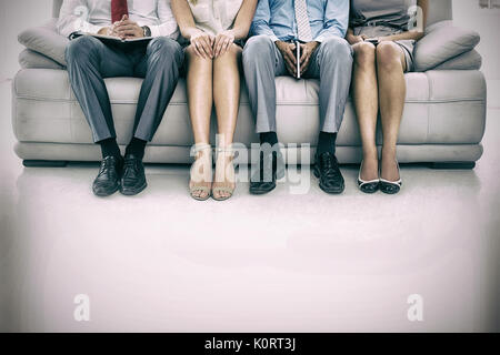 Portrait of executives waiting for job interview in office Stock Photo