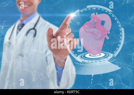 Midsection of doctor touching digital screen against royal blue Stock Photo