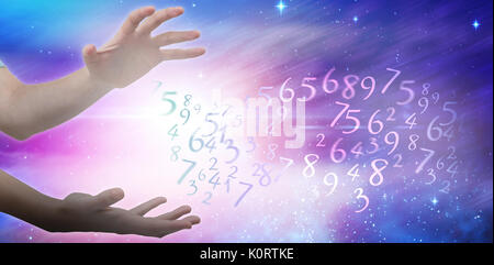 Hands gesturing against white background against digitally composite image of colorful lights Stock Photo