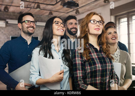 Group picture of young successful team of designers Stock Photo