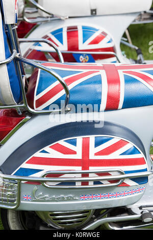 Mods vespa custom scooter covered with union jacks at a vintage retro festival. UK Stock Photo