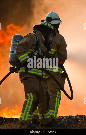 Jet Fuel Fire Protection Firefighters from the 932nd, 910th, and 349th Civil Engineer Squadrons ...