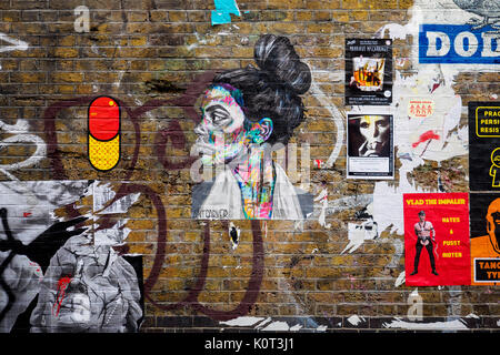 Art graffiti in Brick Lane. Shoreditch, London (UK).