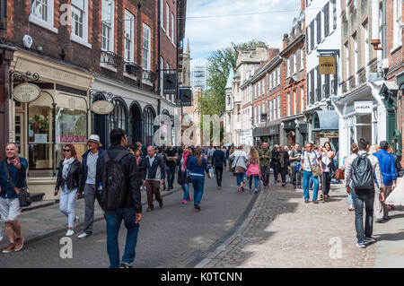 Shoppers and tourists in Trinity Street, Cambridge, England. Stock Photo