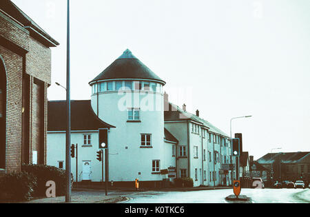 English Classic town in old filter color. UK road town with traffic sign. Stock Photo