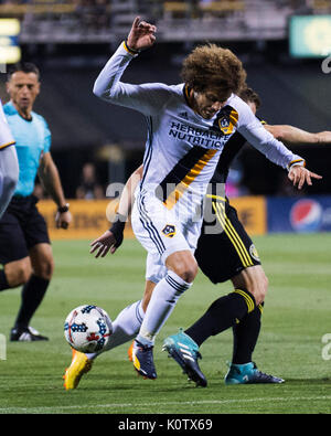 Columbus, USA. 22nd Aug, 2017.  Los Angeles Galaxy midfielder João Pedro (88) gets tripped iup by Columbus Crew SC midfielder Wil Trapp (20) in their match at Mapfre Stadium. Columbus, Ohio, USA. Credit: Brent Clark/Alamy Live News Stock Photo