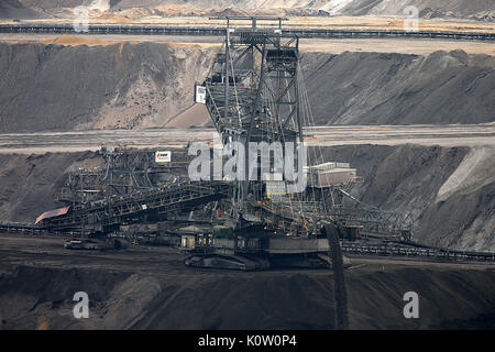 A brown coal excavator pictured at the Garzweiler surface mine near Erkelenz, Germany, 24 August 2017. No protests have been reported yet at the start of the registered protest day by brown coal opposers. Photo: Oliver Berg/dpa Stock Photo