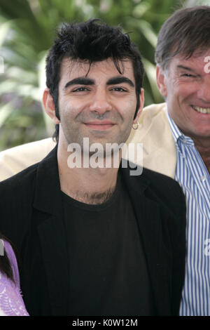 (dpa) - German film maker Fatih Akin smiles as she attends the 58th International Film Festival in Cannes, France, 11 May 2005. Akin is a member of this year's film jury. | usage worldwide Stock Photo