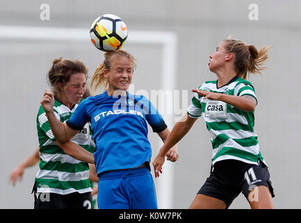 Budapest, Hungary. 25th August, 2017. Diana Csanyi (R2) of MTK Hungaria FC wins the ball in the air from Carlyn Baldwin (L) of Sporting CP and Tatiana Pinto #11 of Sporting CP during the UEFA Women's Champions League Qualifying match between Sporting CP and MTK Hungaria FC at Nandor Hidegkuti Stadium on August 25, 2017 in Budapest, Hungary. Credit: Laszlo Szirtesi/17�Թ����� Live News Stock Photo