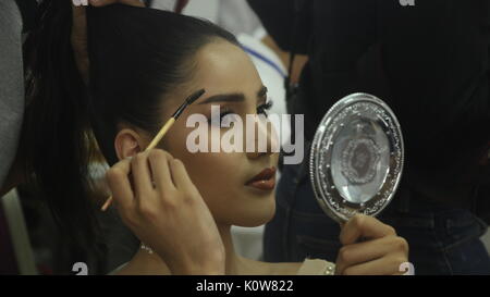 Pattaya, Thailand. 25th Aug, 2017. A transgender beauty contestant has make up applied before a competition in Pattaya, Thailand. The Miss Tiffany's Universe transgender beauty contest has taken place annually in Pattaya since 2004 and is broadcast live on Thai national television. Credit: John Vincent/Alamy Live News Stock Photo