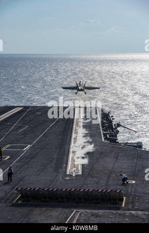 170821-N-NQ487-216 ATLANTIC OCEAN (Aug. 21, 2017) An F/A-18F Super Hornet, assigned to the 'Red Rippers' of Strike Fighter Squadron (VFA) 11, launches from the flight deck of USS Harry S. Truman (CVN 75). Truman is currently underway conducting Flight Deck Certifications in preparation for future operations. (U.S. Navy photo by Mass Communication Specialist Seaman Kaysee Lohmann/Released) Stock Photo