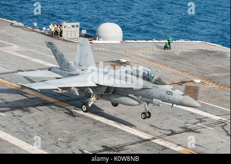 170821-N-UJ486-120  ATLANTIC OCEAN (Aug. 21, 2017) An F/A-18F Super Hornet assigned to the “Red Rippers” of Strike Fighter Squadron (VFA) 11 lands on the flight deck of the aircraft carrier USS Harry S. Truman (CVN 75). Harry S. Truman is underway conducting flight deck certifications in preparation for future operations. (U.S. Navy photo by Mass Communication Specialist Seaman Rebekah A. Watkins/Released) Stock Photo