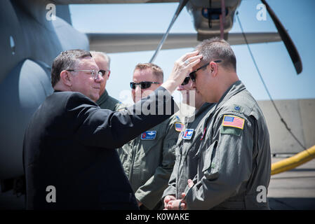 The Bishop of Biloxi, Bishop Louis Kihneman, blesses the 403rd Wing's fleet of aircraft Aug. 17, 2017 at Keesler Air Force Base, Mississippi. Kihneman visited the 403rd Wing to learn more about its mission. (U.S. Air Force photo/Staff Sgt. Heather Heiney) Stock Photo